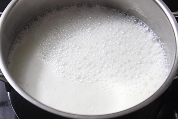 boiling point of milk celsius