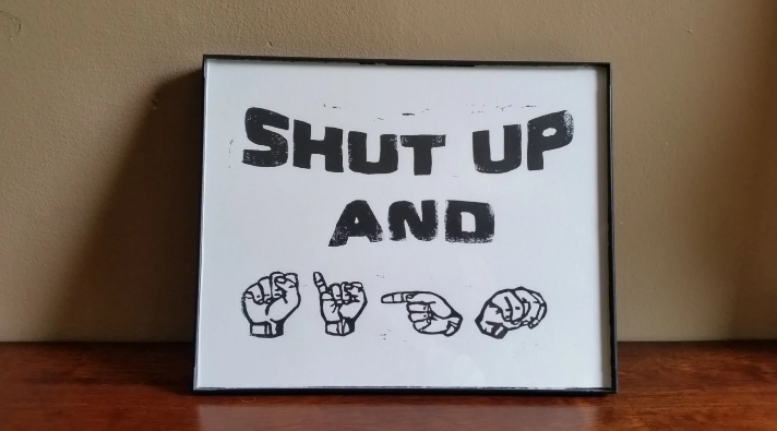 how to say shut up in sign language